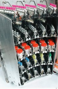 Specimen storage trays loaded into Automated Microbiology Specimen Processor