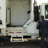 Presence Sensing Step installed on side-loading garbage truck